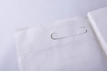 Patient transfer sheet with handles