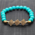 Bracelet de pierres précieuses étirées turquoise avec perles rondes de 8MM avec pièce en diamante