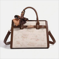 Lady's fashionable embroidered handbag