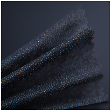 Shrink resistant double dot non woven fusible interlining