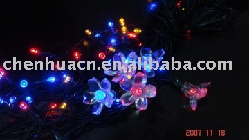 solar holiday light string with colorful flower