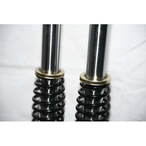 Amortiguador de 3 ruedas con puntas de resorte exterior