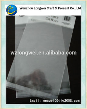 cheap custom self adhesive opp bag/opp bag with header