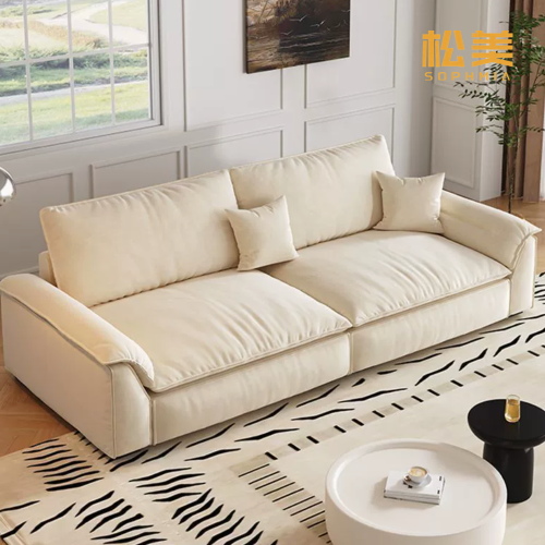 Большой диван из мягкой ткани бежевого цвета