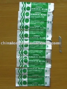 Surgical Blade/Skin Stapler