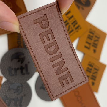 Best Selling Custom Brand Jeans Clothing Tags: PU Label Embossed/Metal Leather Patches for Garments