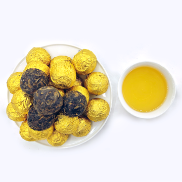 กลิ่นหอมที่อุดมไปด้วยและรสชาติ Mini Pu'er Xiaojintuo (ชาดิบ)