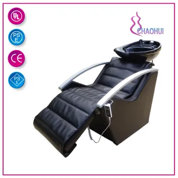 Comfortable electric shampoo chair in salon