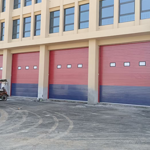 High speed rolling up overhead sectional door