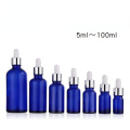 1oz Blue Glass Round Bottles with Black Droppers