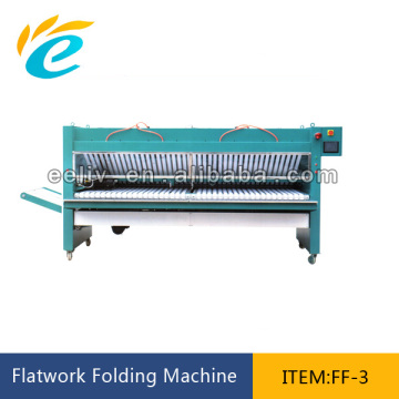 Laundry textile folding machines