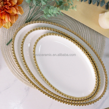 RP024: 14 Inch Oval Platters and 10-12 Inch Porcelain Serving Dishes with Silver Beads Rim