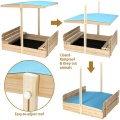 Sandpit exterior con cubierta ajustable para la playa.