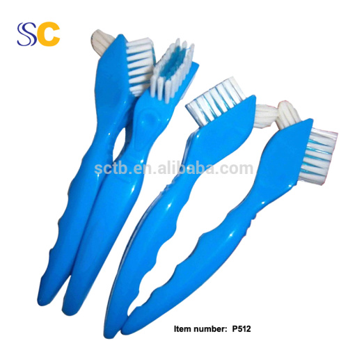 Brosse à dents pour dentier double face