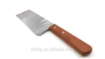 wood handle stainless steel tomato knife , tomato cut