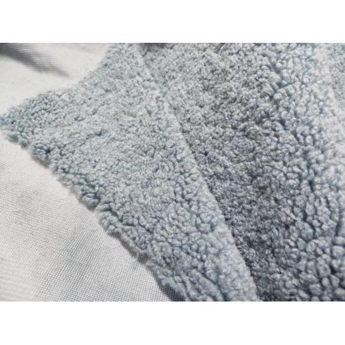 100% polyester Sherpa-liknande fleece varp-stickat tyg
