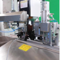 Macchina per stripping a filo multiplo
