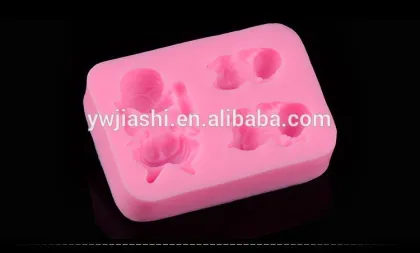 Lively baby is playing fondant mold cake