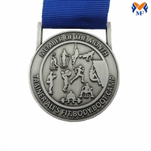 Silver embossed sport member medal