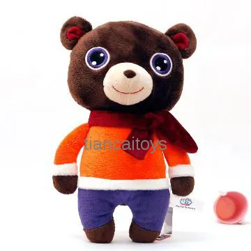 sitting plush toy bear with neckerchief