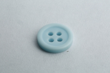 Element edge magnetic buttons for sweaters