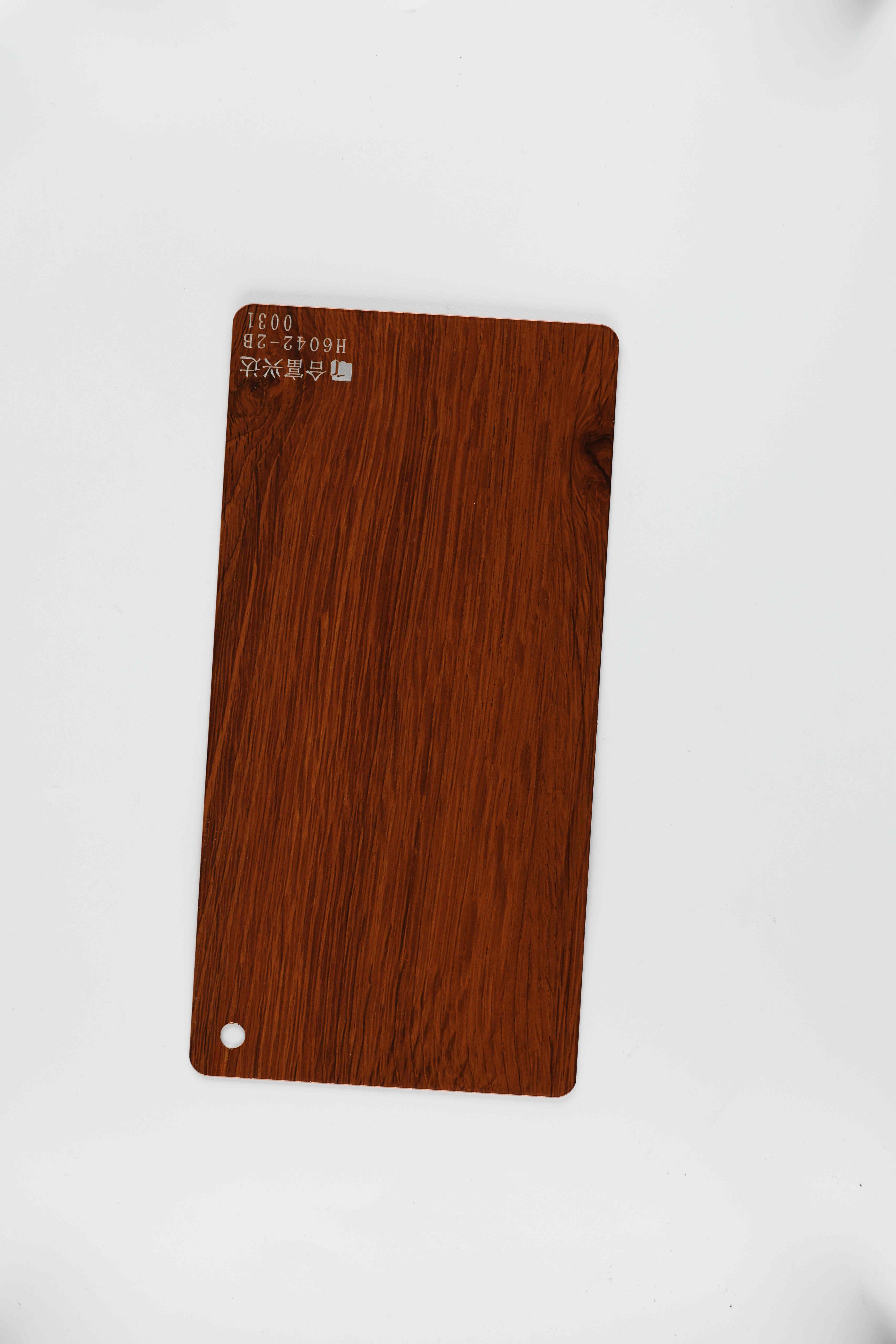 एम्बर टीक वुड ग्रेन टेक्सचर H6042 का क्लोज़-अप