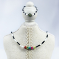 Ensemble de collier de perles en verre noir et blanc