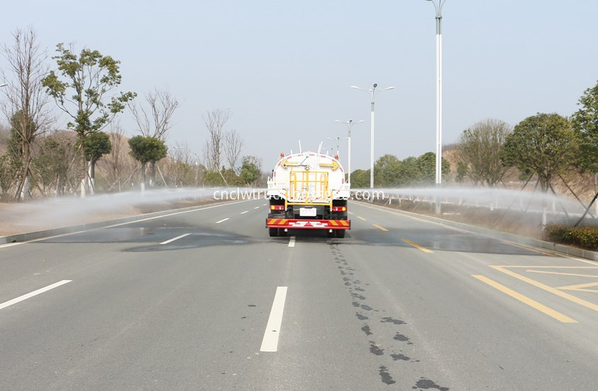 water spray truck  in action 3