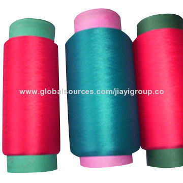 Polyester covered spandex yarn