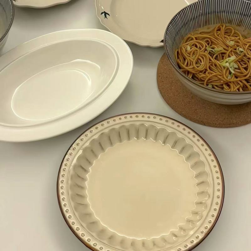 Elegant Ceramic Plates with Delicate Swallow Motifs