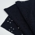 Tessuti a maglia su un lato con ricamo imitazione