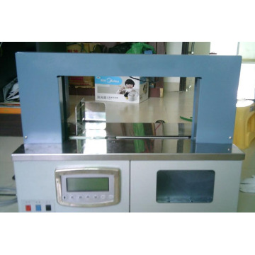 banderolleermachine met papier of opp riemverpakking;