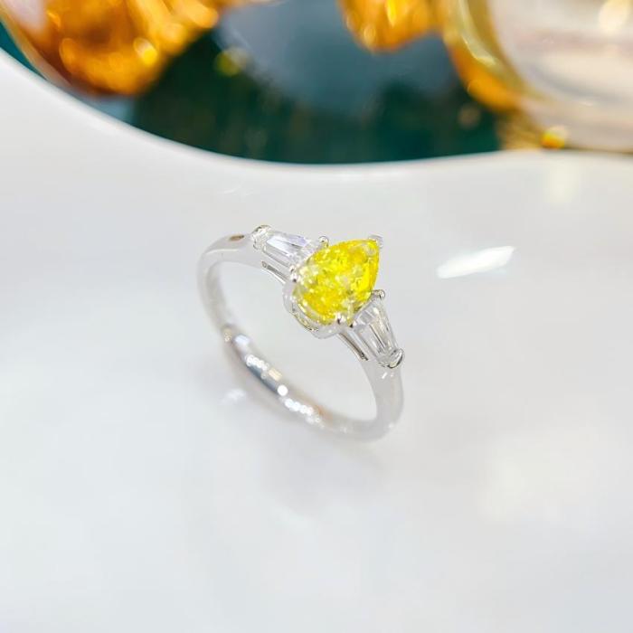 Anillo baguette cónico con diamante de laboratorio en forma de pera amarilla