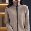 Woolen knit pullover with hem and pile neck