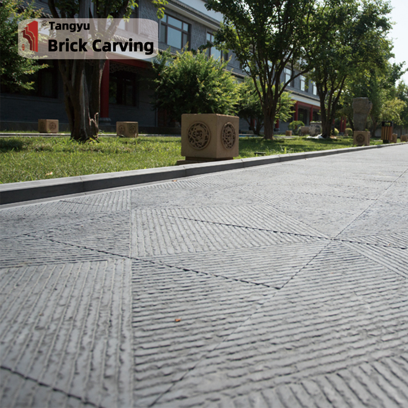 Stone floor tiles with engraved diagonal stripes