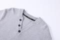 Gebreide Henley-trui met knopenhals en getextureerde voorkant