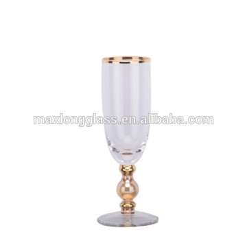 Clear champagne glass with gold painting