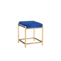 Taburete lujoso de terciopelo azul con patas de acero inoxidable