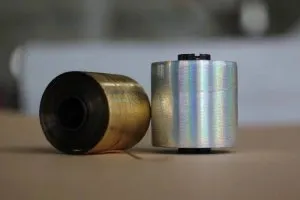 Holographic adhesive cigarette tear tape