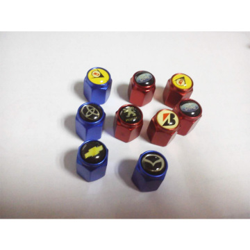 Car Maker Logo Tire Valve Stem Caps: Ford, Chervolet, Mazda" 

However, considering common practices and readability, a more refined version might be:

"Tire Valve Stem Caps with Car Maker Logos: Ford, Chevrolet, Mazda