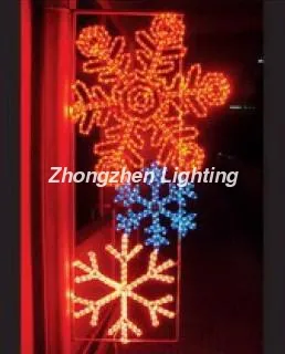 Snowflake motif Christmas celebrating light pole mounted motif