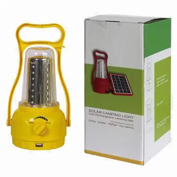 Solar lantern with AC charging port and cell phone charging