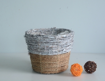 Round rattan and seagrass flower pot