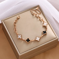 Brazalete de titanio de trébol blanco blanco elegante