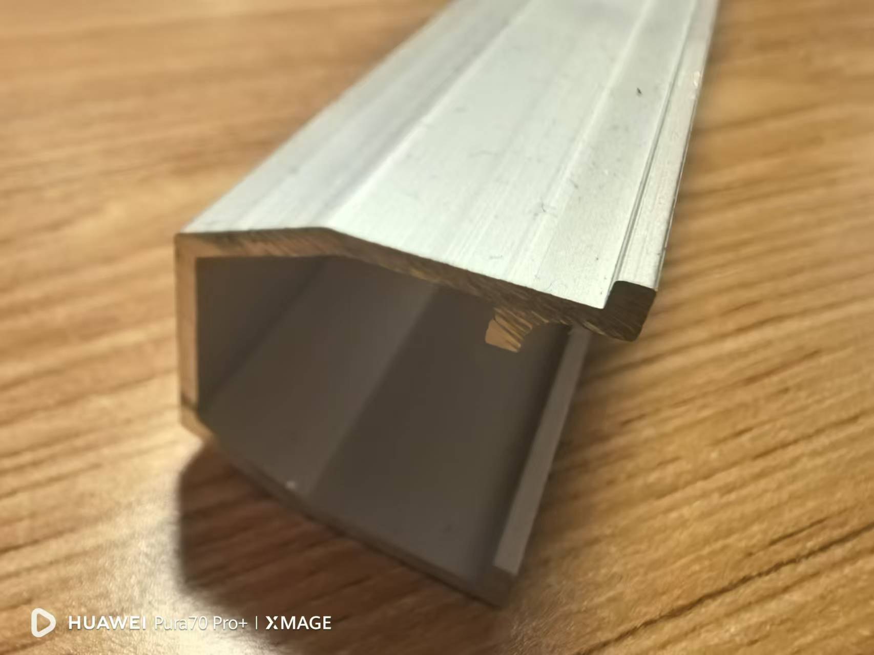 Aluminum alloy anodized extrusion tracks