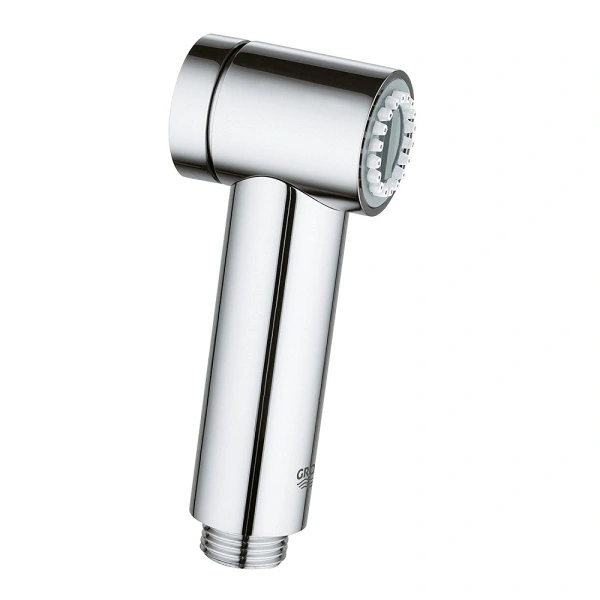 Detailed view of brass shattaf bidet spray handle and hose connections