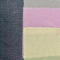 Tessuto jersey lavorato a maglia con pois glitter dorati