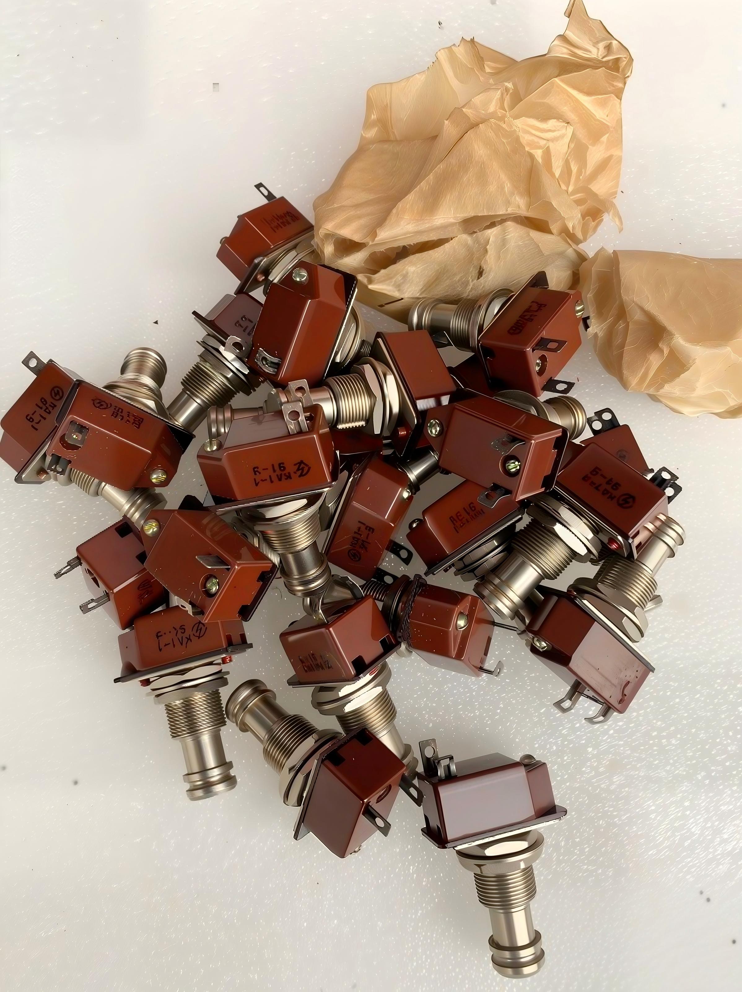 KA1-1 Button Switch - side angle showing metal housing and terminals