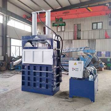 Baler kompres gentian sawit