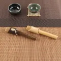 Frusta Matcha artigianale in bambù per i tradizionali rituali del tè